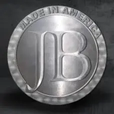 A silver coin with the words " made in america " on it.
