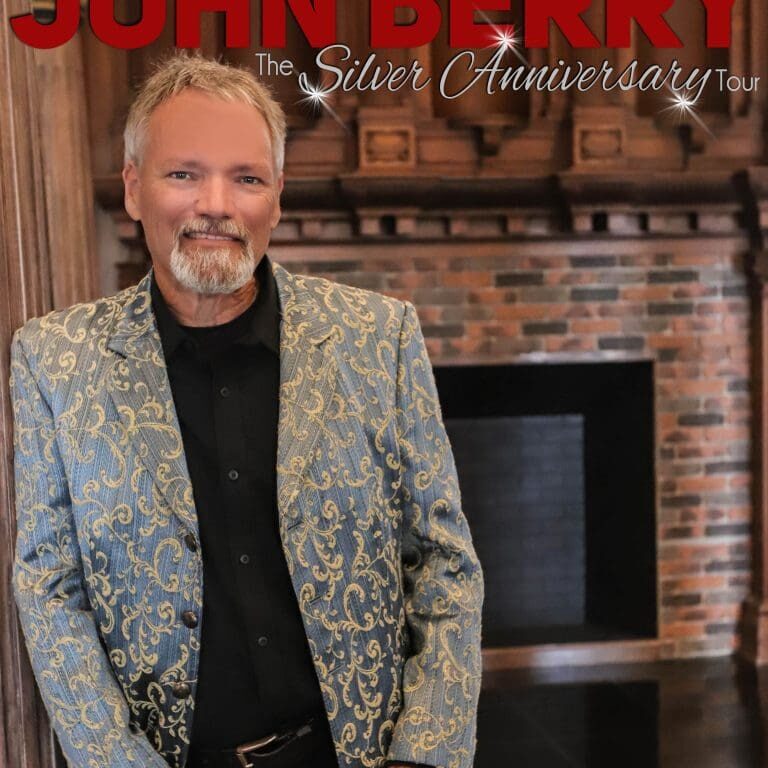 A man in a suit standing next to a fireplace.